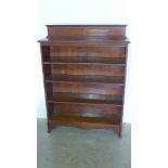 An Edwardian oak four shelf bookcase - Height 124cm x 92cm x 25cm