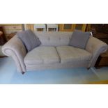 A John Lewis buttoned upholstered sofa with two scatter cushions in good condition - Height 77cm x