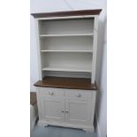 A cream finished modern dresser,