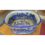 A blue and white landscape decorated footbath - in good condition - 28cm x 48cm x 22cm high