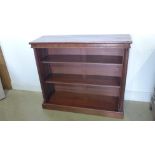 A Regency mahogany open bookcase with rope twist columns,