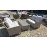 A pair of two seater Bramblecrest Patagonia sofas and coffee table