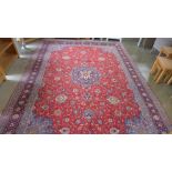 A hand knotted woolen Sarough rug - 3.95m x 2.