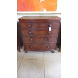 A Victorian mahogany bow front chest of two short over three long graduated drawers raised on