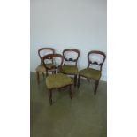 A set of four Victorian mahogany balloon back chairs