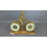 A brass clock barometer in the form of a cyclist on a marble base - Height 28cm x 20cm - clock not