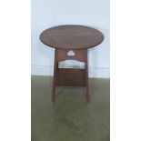 An Arts and Crafts oak side table with heart motif stamped 2219 in the Liberty style - Height 69cm