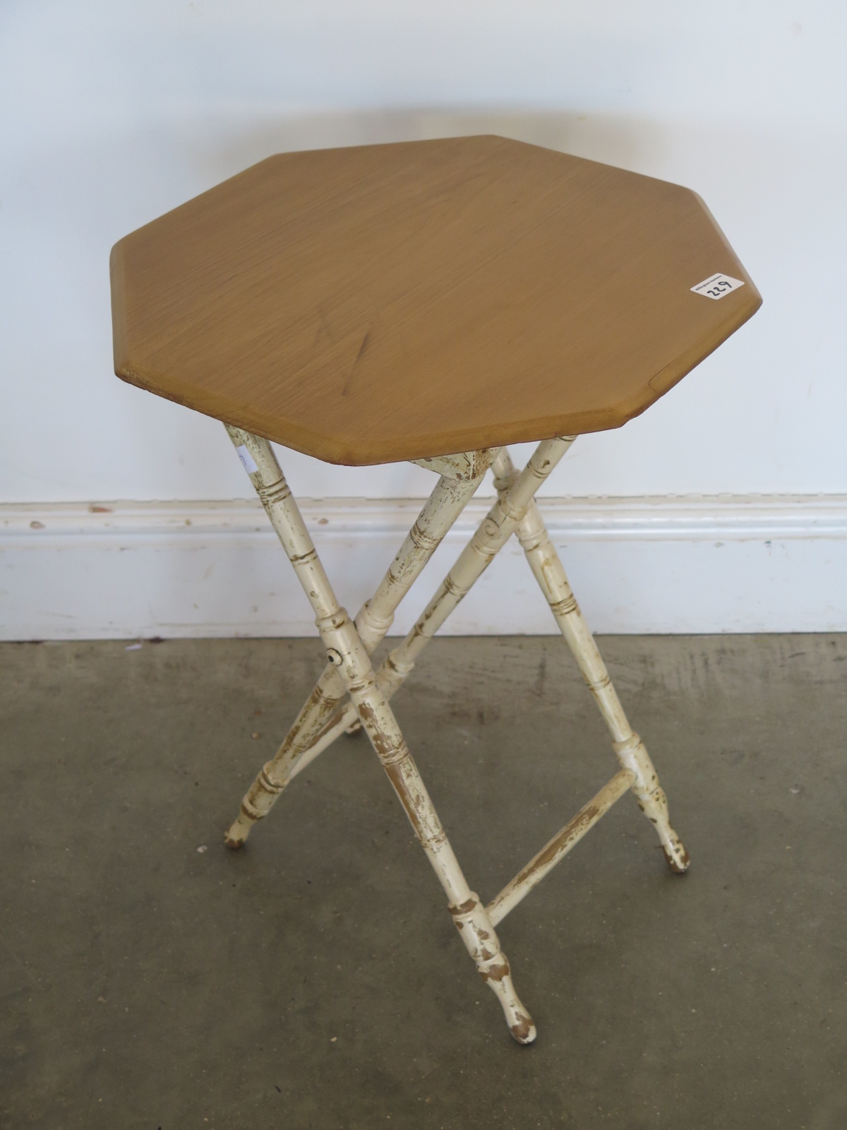A folding Edwardian pine top occasional table with old paint to base - all waxed