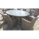 A Bramblecrest Sahara oval table with eight chairs and a parasol and base- no cushions
