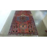 A handknotted woolen Hamadan rug - 2.10m x 1.