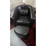 A modern brown leather upholstered tub chair puffe and cushion