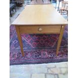 A mid Victorian pine kitchen table with single drawer to one end - In good condition - Length 137cm