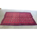 A handknotted woolen Baluchi rug - 1.84m x 1.