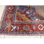 A hand knotted woolen Hamadan rug - 3.68m x 2.