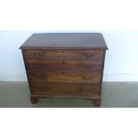 A Georgian mahogany chest with four long graduating drawers on shaped bracket feet - Height 83cm x