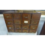 An oak bank of index card drawers - Height 33cm x 47cm x 25cm