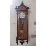 A 19th century single weight walnut Vienna wall clock with secondary dial - Height 123cm - the