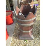 A 19th/20th century castle top chimney pot - Height 76cm