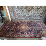 A hand knotted woolen Hamadan rug - 2.80m x 1.