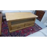 A solid oak two drawer double sided coffee table - Width 110cm x Depth 55cm x Height 48cm