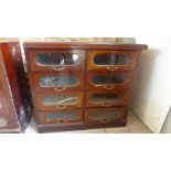 An Edwardian mahogany bank of eight haberdashery drawers - Height 90cm x 101cm x 41cm - drawers
