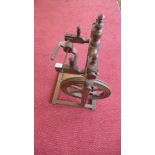 A spinning wheel with adjustable upper mechanism,