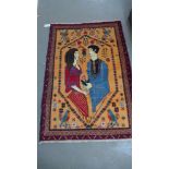 A hand knotted woolen Tribal Pictorial rug - 97cm x 147cm