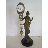 An early 20th century Diane mystery arm clock - Arabic numerals to dial - Height 35cm