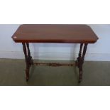 A Victorian mahogany stretcher table on turned supports - Height 67cm x 90cm x 43cm