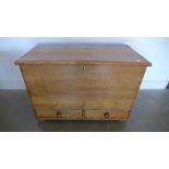 A 19th century stripped pine mule chest with two base drawers on turned feet - Height 71cm x 105cm