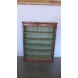 A mahogany open bookcase of four adjustable shelves - 118cm x 34cm x 148cm high