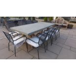 A Bramblecrest rectangular stone table with ten chairs and cushions