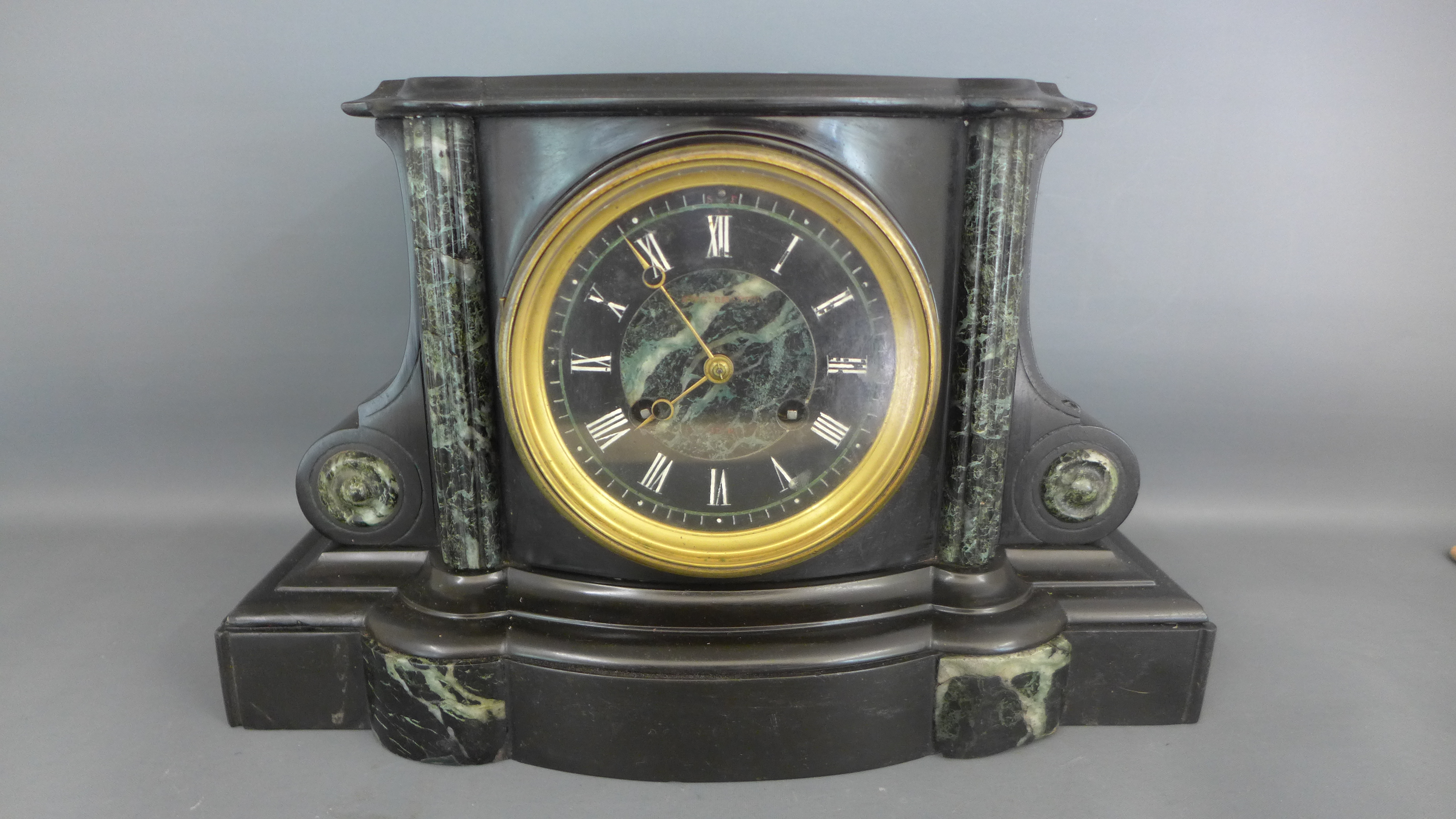 A Belgian slate and marble mantle clock,