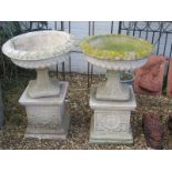 A pair of reconstituted stone campana shaped garden urns on square bases - Diameter 60cm x Height