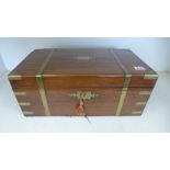 A 19th century mahogany brass bound writing slope with secret drawers one corner missing otherwise