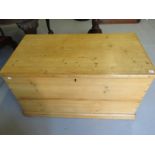 A large Victorian stripped pine blanket box with interior candle box - Height 57cm x Width 102cm