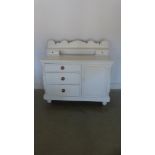 A Victorian painted pine dresser with an upstand above three drawers and a cupboard - Height 112cm