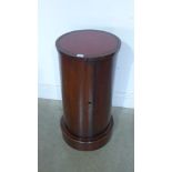 A mahogany cylinder cupboard with a leather inset top - Height 72cm x 35cm diameter of top