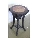 An Oriental hardwood marble top jardiniere stand - Height 60cm x Diameter 35cm