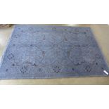A blue ground handmade Agra carpet - 2.30m x 1.