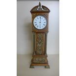 A miniature oak and ormolu mounted grandfather clock with a French movement by R and Co Paris -