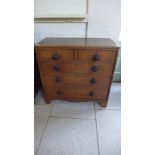 A 19th century oak chest with two short over three long drawers - Height 89cm x 92cm x 46cm