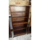 A tall 20th century open bookcase with adjustable shelves - Height 146cm x 69cm x 25cm