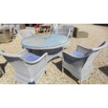 A Bramblecrest circular table and four chairs - wrong size glass