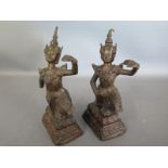 A pair of Indo China figures of Deities finished in a cast metal - approx height 12cm