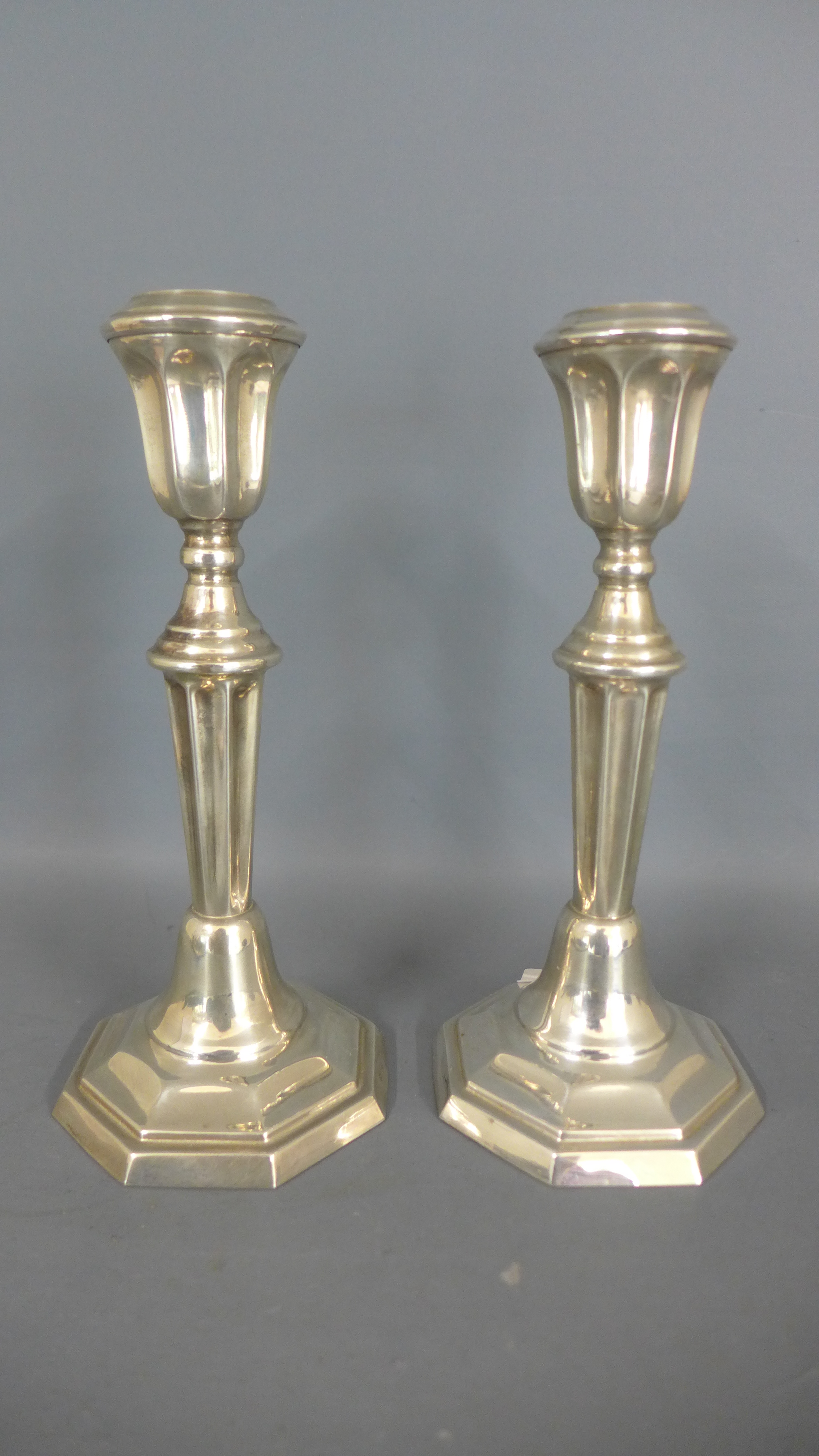 A pair of 925 silver candlesticks with weighted bases - Height 18cm - in good condition
