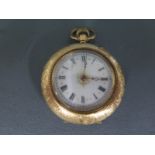 A 14ct yellow gold cased open faced ladies pocket watch - The case with foliate engraving and