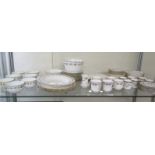 A Royal Stafford coffee part service of six cups and seven saucers,