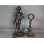 Two cast iron door stops,