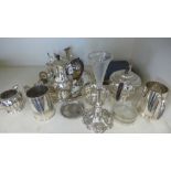 A selection of silver plated items including a tea pot, coffee pot,